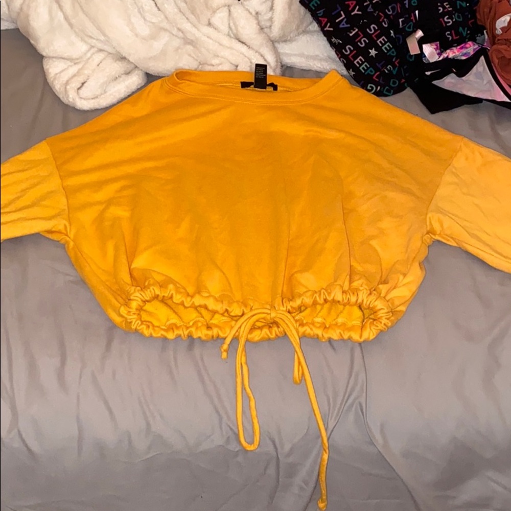 FOREVER 21 YELLOW DRAWSTRING BOGTOM LONGSLEEVE